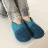 boy wearing blue boys wool slippers DUO by wooppers