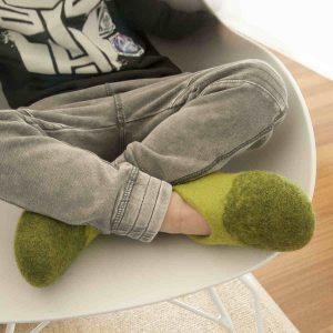 Kid wearing Kids wool slippers green-yellow, DUO kids collection by Wooppers