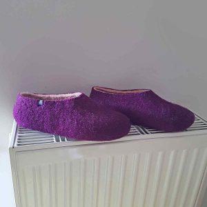 washing wooppers slippers - drying on radiator
