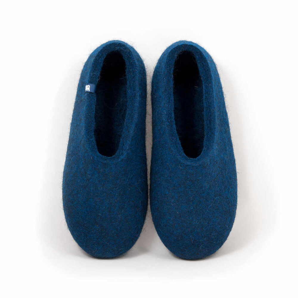 pair of felted wool slippers in aquamarine blue, in a continuous shape seen from above