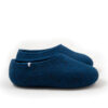 A pair of felted wool slippers in aquamarine blue, in a continuous shape seen from the right side