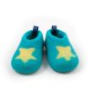 Toddlers slippers to wear at home by Wooppers. A pair pictured in front view in turquoise merino wool with a yellow star in the front part for decoration