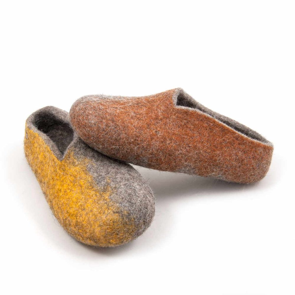 Stylish ladies' slippers from the SEASONS collection by Wooppers. They are grey with colors on the outer side of the shoe. The left shoe with blown on the side rests on the right one with yellow on its side.