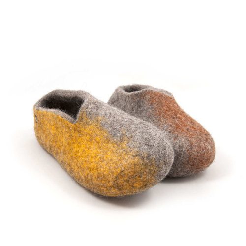 Stylish ladies slippers in earthy colors from the SEASONS collection by wooppers. This is a front view of a pair of wool slippers in grey. the right one has yellow on the right side of the shoe and the left has a warm brown on the left side of the shoe.