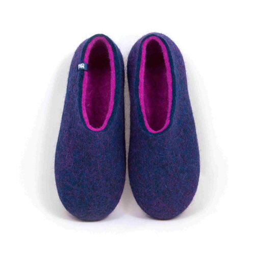 Blue wool slippers with fuchsia interior seen from top.