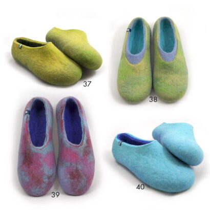 Four unique pairs of wooppers slippers made in various colors of greens and blues made of self dyed wool.