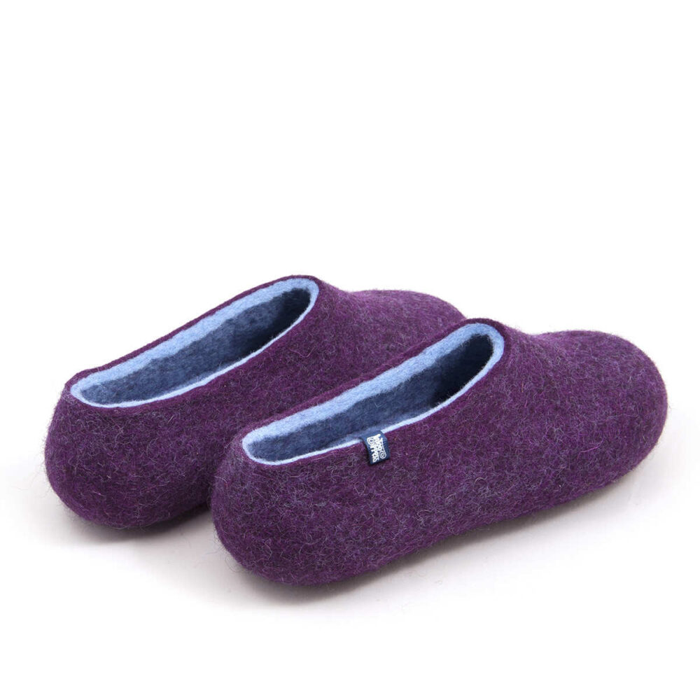 Purple wool slippers, baby blue on the inside as seen from the back.