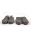 Organic wool slippers dark grey - white, COLORI wooppers collection. We see two pairs, high and low cut at the ankle area. Pictured from the front.