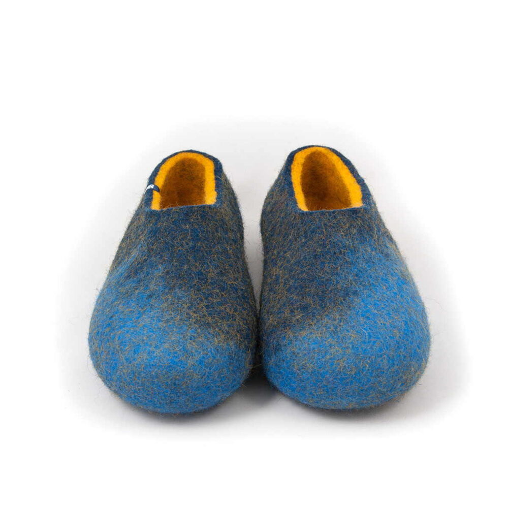 Pair of wool felt slippers for women from the AMIGOS collection in skyblue blue and yellow lining pictured from the front.