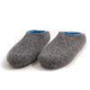Felted wool house slippers Grey with blue interior. Seen from the front this pair has a low cut at the back. Felt wool shoes by Wooppers.