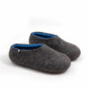 Felted wool house slippers Grey with Blue interior. Seen from the side this pair has a low cut at the back. Felt wool shoes by Wooppers.