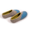 AMIGOS blue natural lime felt wool slippers by Wooppers -e Seen from the right back side - A pair of house shoes for women made of felt wool (slip-on, closed-back, low-cut ankle) mottled grey with bright blue in the area of the toes and lime green on the inside. The whole shoe is one continuous piece of felt - no stitches.