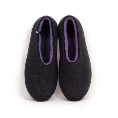 A pair of wool house slipper shoes with lilac on the inside. Top view.