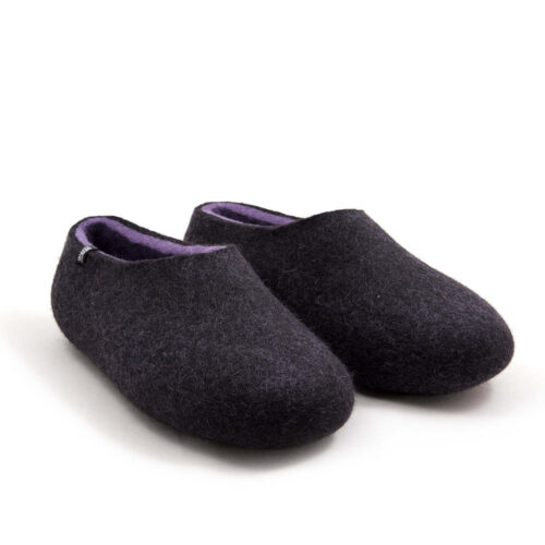 A pair of wool house slippers with lilac on the inside. Three quarters view.
